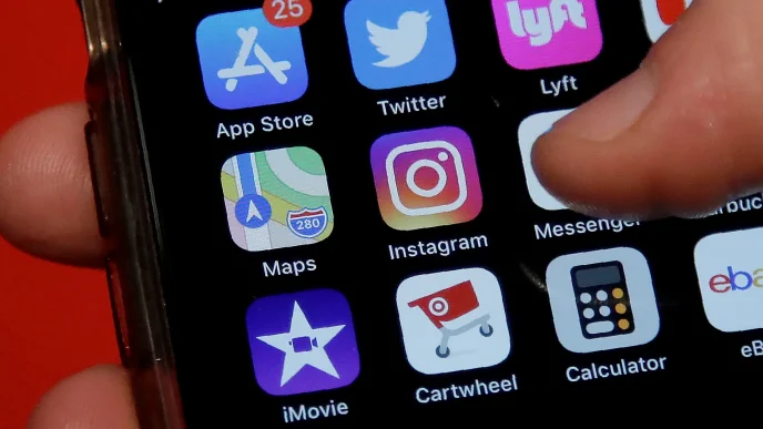 Close-up of a smartphone home screen showing app icons: App Store, Twitter, Lyft, Maps, and Instagram, with a finger near the right edge.