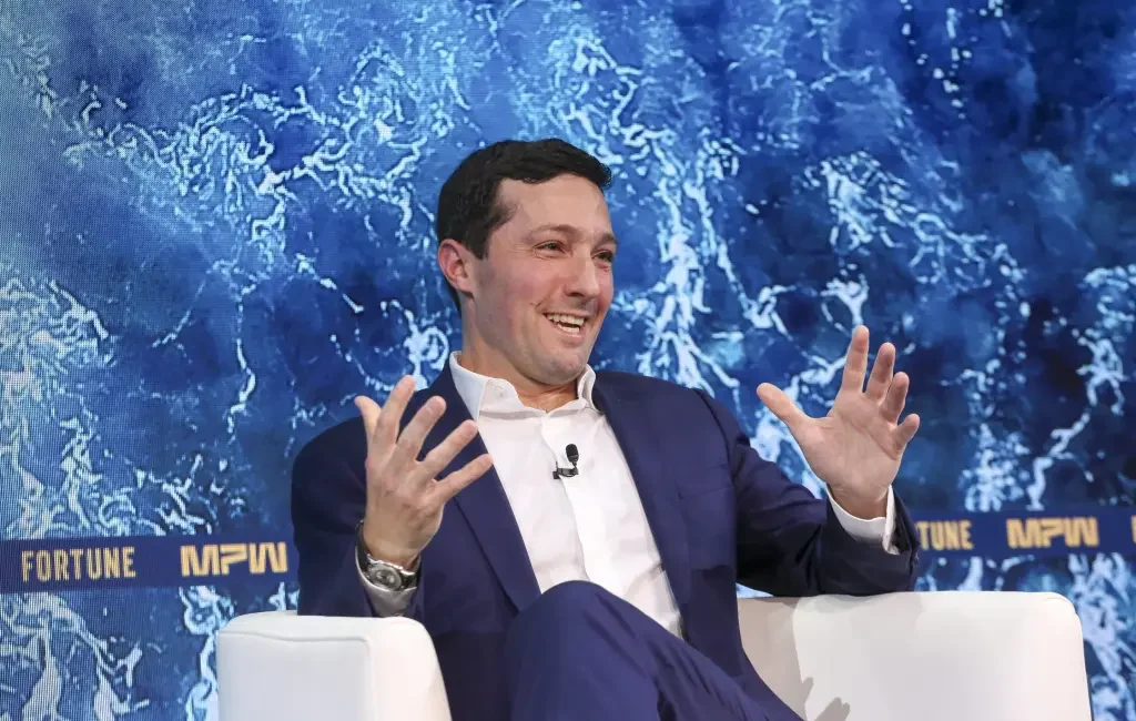 Evan LePatner speaking at the Fortune Most Powerful Women event