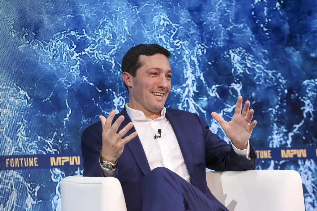 Evan LePatner speaking at the Fortune Most Powerful Women event